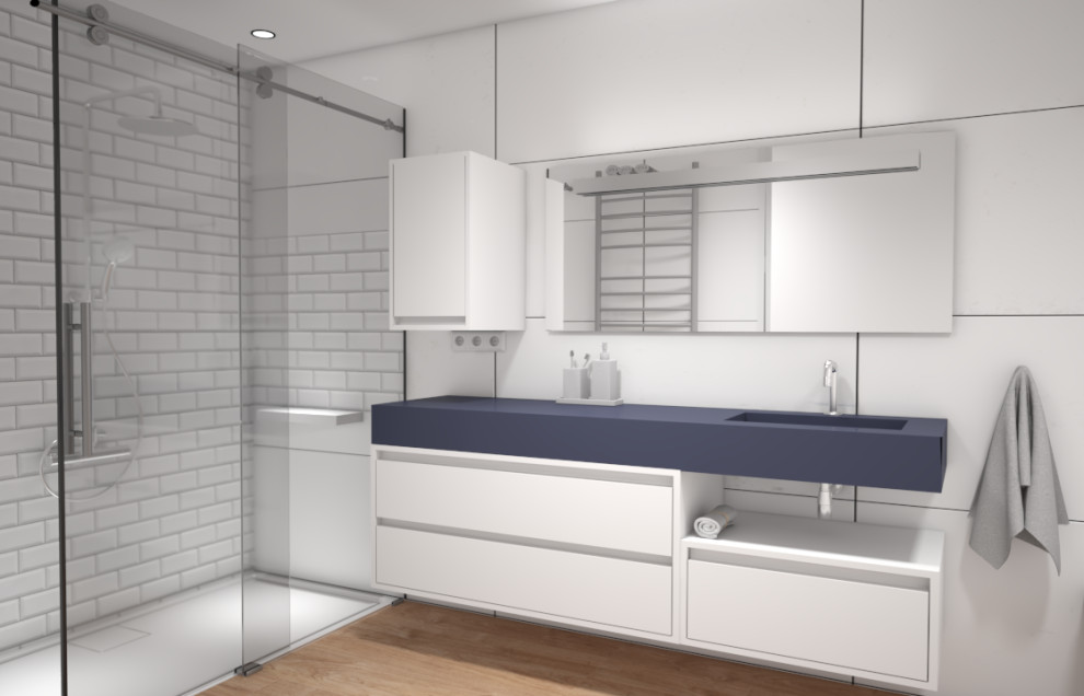Foto på ett litet funkis blå badrum med dusch, med släta luckor, blå skåp, en dusch i en alkov, vit kakel, vita väggar, ett integrerad handfat, bänkskiva i akrylsten, brunt golv och dusch med skjutdörr