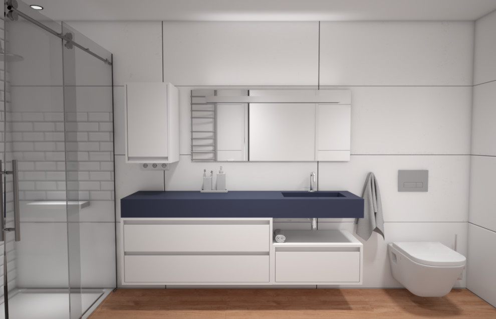 Idee per una piccola stanza da bagno con doccia minimalista con ante lisce, ante blu, doccia alcova, piastrelle bianche, piastrelle effetto legno, pareti bianche, lavabo integrato, top in superficie solida, pavimento marrone, porta doccia scorrevole, top blu, toilette, un lavabo, mobile bagno sospeso e soffitto ribassato