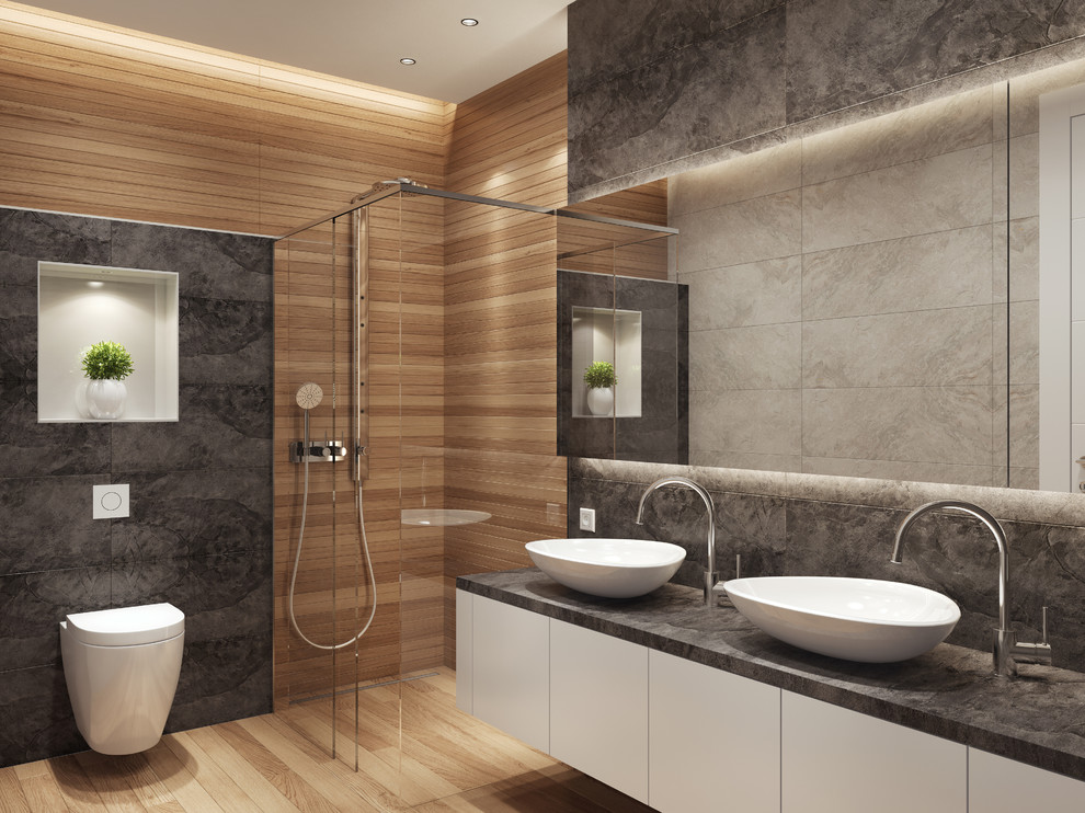 Large trendy master brown tile and ceramic tile porcelain tile and brown floor bathroom photo in Malaga with shaker cabinets, white cabinets, a one-piece toilet, brown walls, a vessel sink and brown countertops