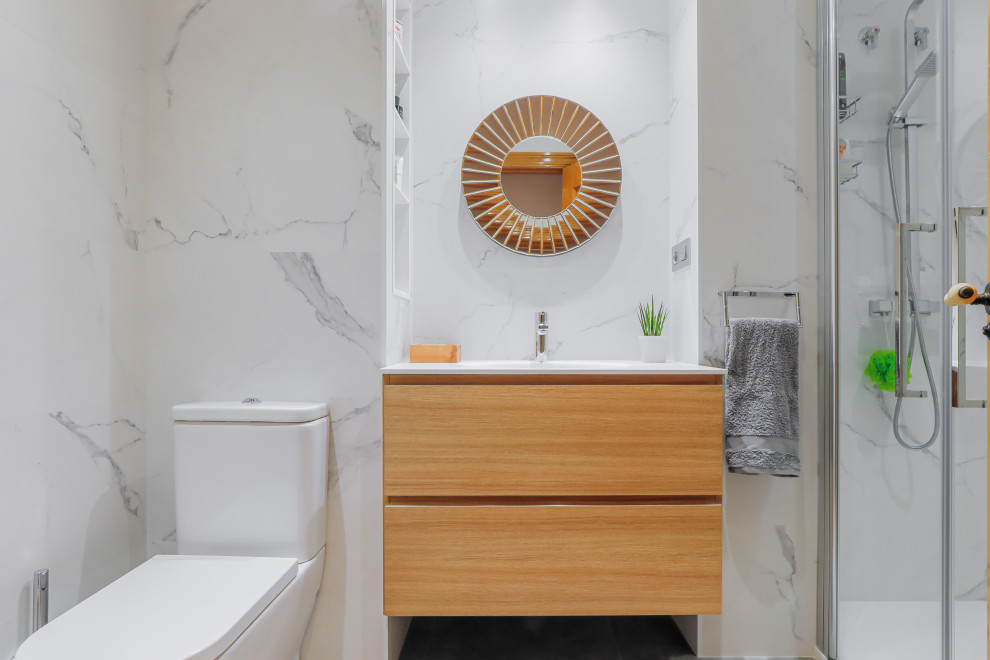 Contemporary shower room bathroom in Other with flat-panel cabinets, beige cabinets, an alcove shower, a one-piece toilet, grey tiles, white tiles, porcelain tiles, solid surface worktops, a hinged door and white worktops.