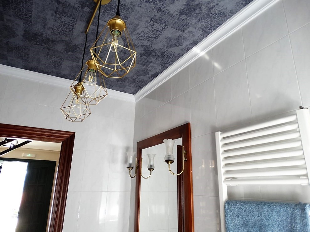 This is an example of a medium sized traditional shower room bathroom in Other with freestanding cabinets, white cabinets, an alcove shower, a two-piece toilet, white tiles, ceramic tiles, white walls, ceramic flooring, a built-in sink, marble worktops, purple floors and a sliding door.