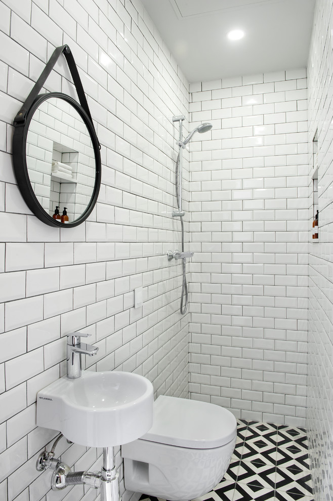Photo of a small contemporary shower room bathroom in Other with a walk-in shower, white tiles, metro tiles, ceramic flooring, a wall-mounted sink, multi-coloured floors and an open shower.
