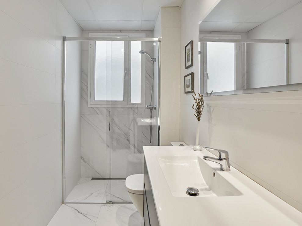 Inspiration for a small modern shower room bathroom in Other with freestanding cabinets, brown cabinets, a built-in shower, multi-coloured tiles, marble tiles, white walls, marble flooring, a console sink, tiled worktops, grey floors, a sliding door and white worktops.