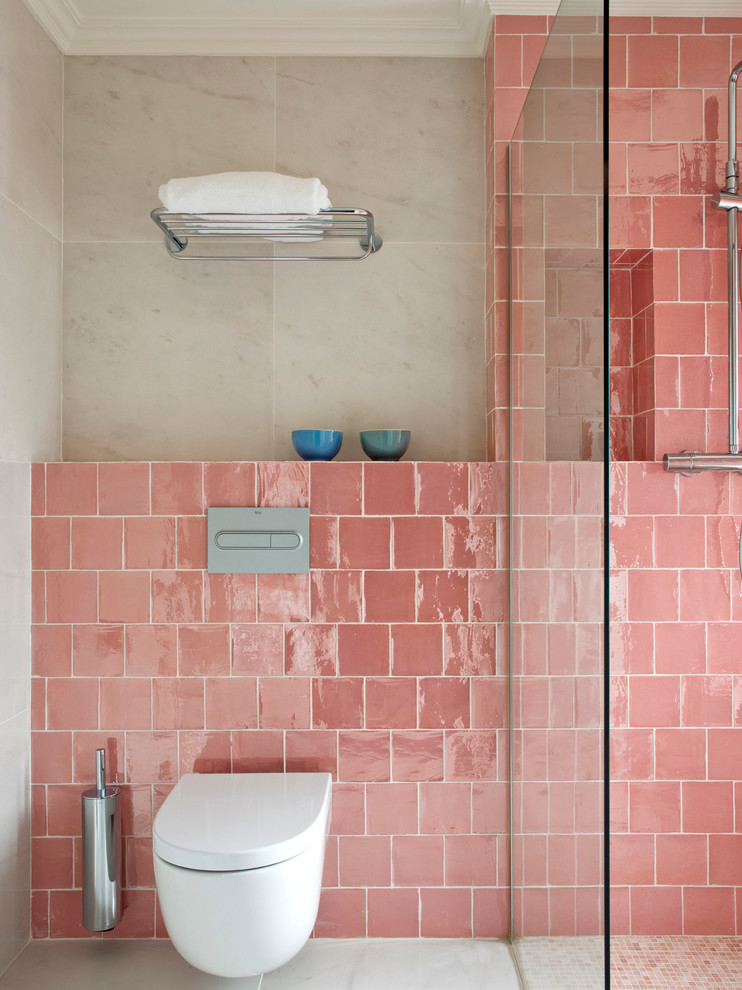 Inspiration for a bohemian shower room bathroom in Barcelona with a built-in shower, a wall mounted toilet, pink tiles, ceramic tiles, beige walls, beige floors and an open shower.