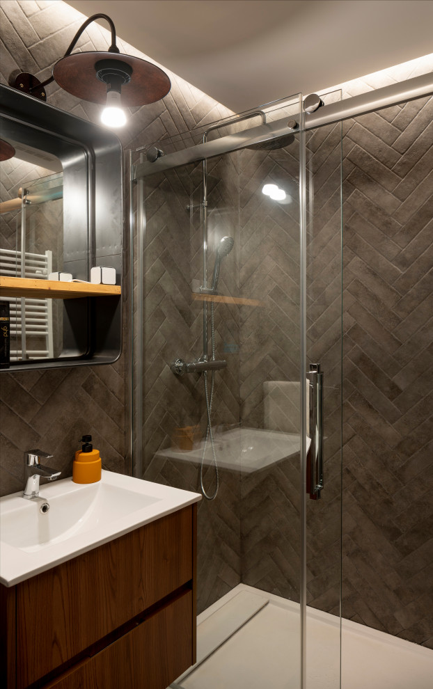 Bathroom - mid-sized contemporary 3/4 gray tile and porcelain tile porcelain tile and beige floor bathroom idea in Bilbao with flat-panel cabinets, medium tone wood cabinets, an integrated sink and white countertops