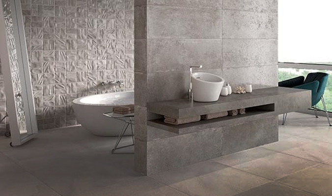 Inspiration for a contemporary ensuite bathroom in Malaga with a freestanding bath, grey tiles, grey walls, porcelain flooring and tiled worktops.
