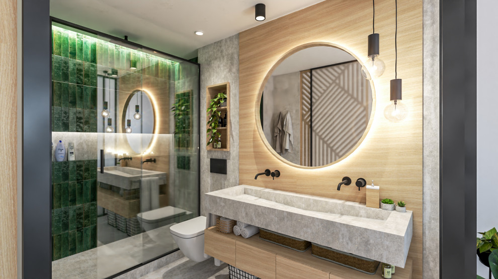 Idéer för ett mellanstort modernt grå en-suite badrum, med släta luckor, grå skåp, en dusch i en alkov, en vägghängd toalettstol, grön kakel, grå väggar, betonggolv, ett avlångt handfat, bänkskiva i betong, grått golv och dusch med skjutdörr