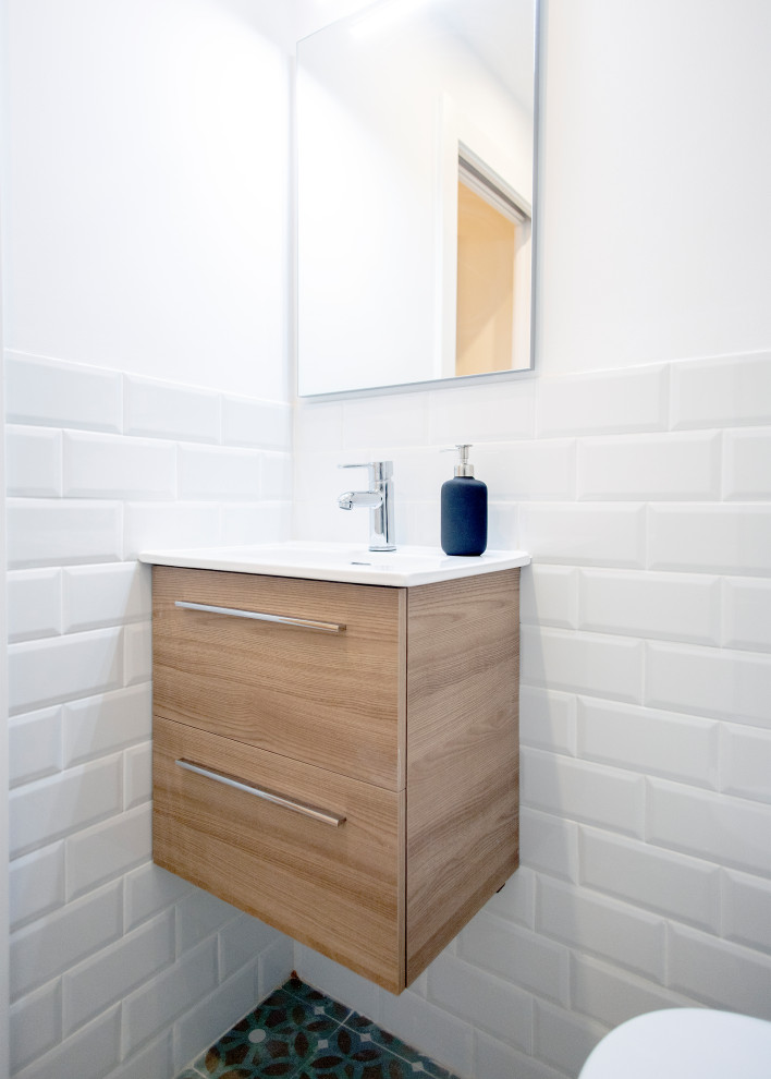Inspiration for a medium sized mediterranean ensuite bathroom in Barcelona with white cabinets, a corner shower, a one-piece toilet, white tiles, ceramic tiles, white walls, a sliding door and white worktops.