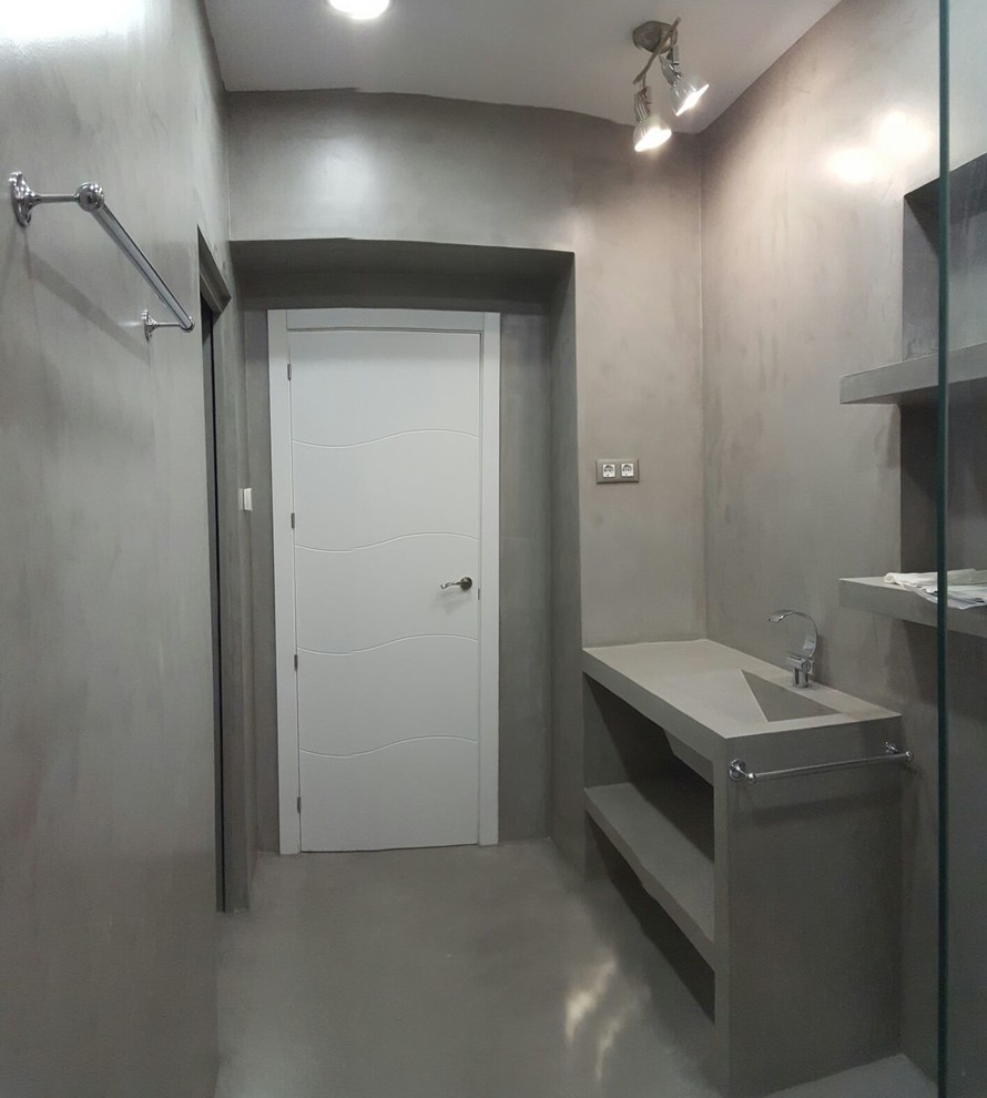 Foto de cuarto de baño industrial con microcemento