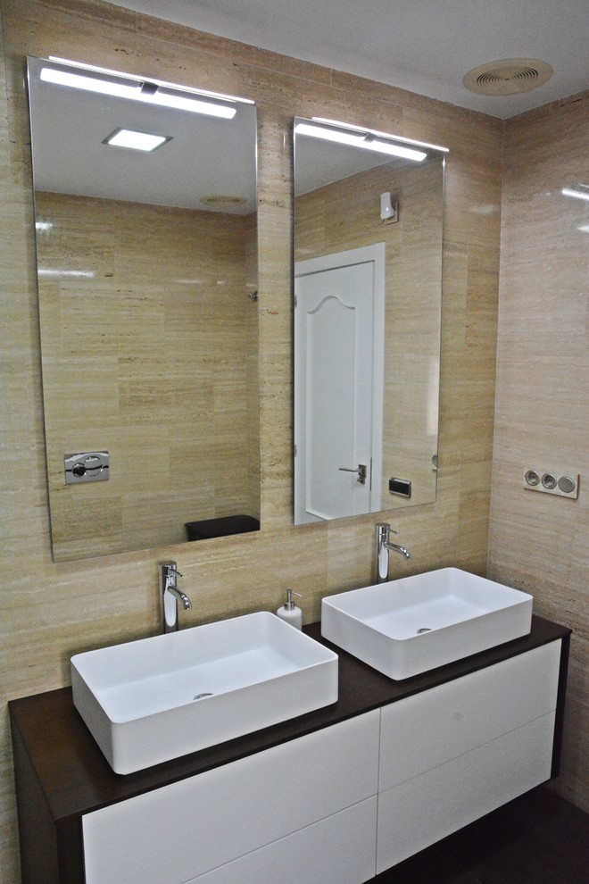 Design ideas for a large modern bathroom in Other with flat-panel cabinets, white cabinets, a walk-in shower, a one-piece toilet, brown tiles, beige walls, ceramic flooring, a vessel sink and wooden worktops.