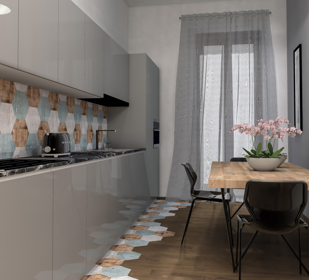 Photo of a medium sized modern single-wall kitchen in Turin with a double-bowl sink, flat-panel cabinets, beige cabinets, marble worktops, stainless steel appliances, porcelain flooring, no island, brown floors and black worktops.