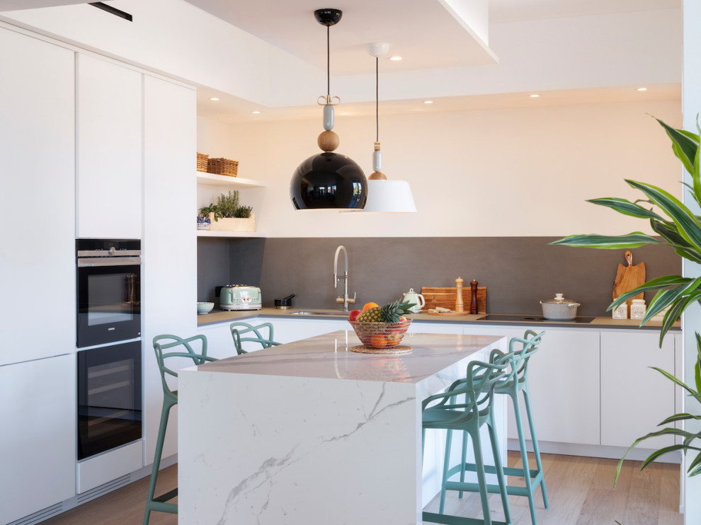 Example of a beach style kitchen design in Milan