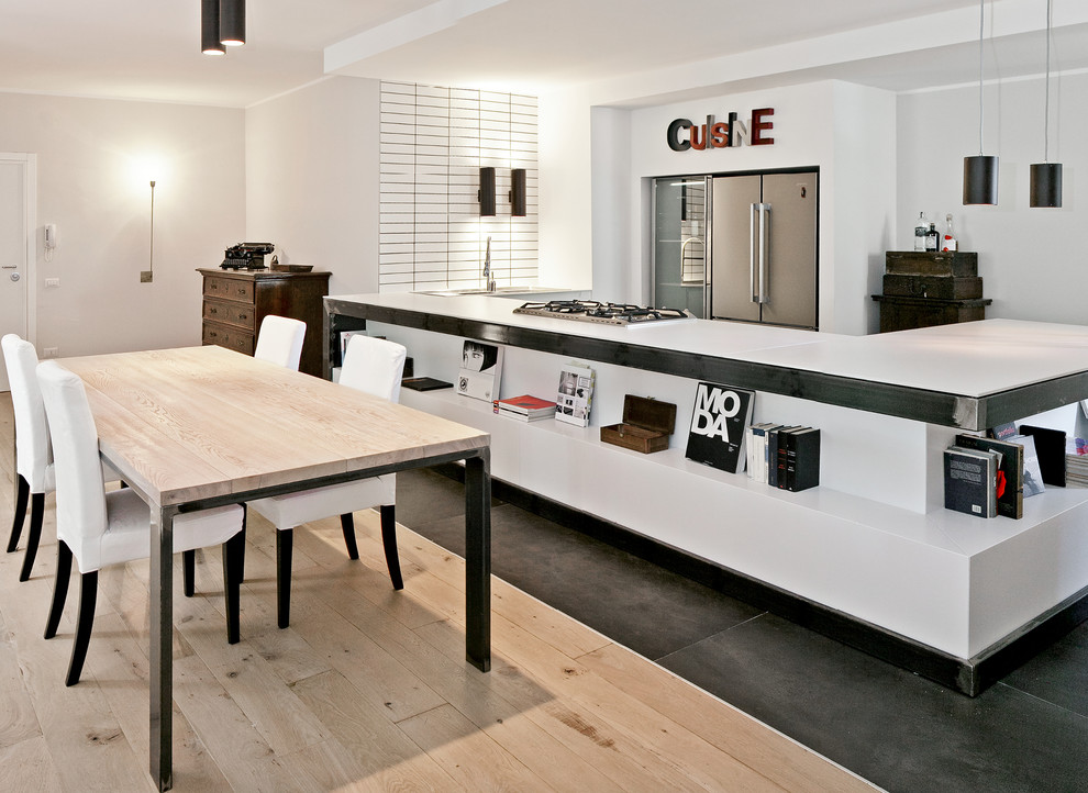 Photo of a large contemporary u-shaped kitchen/diner in Bologna with porcelain flooring, white worktops, grey floors, open cabinets, white splashback, stainless steel appliances and a breakfast bar.