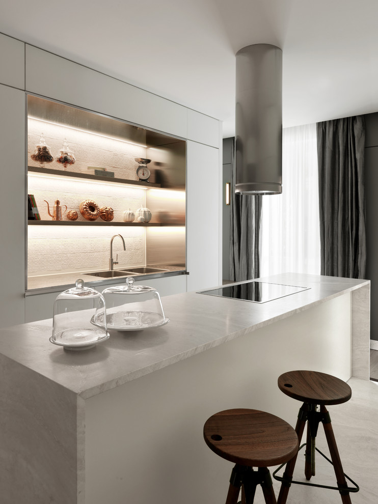 Example of a trendy single-wall white floor kitchen design in Milan with a double-bowl sink, white cabinets, an island, open cabinets, marble countertops, white backsplash and white countertops