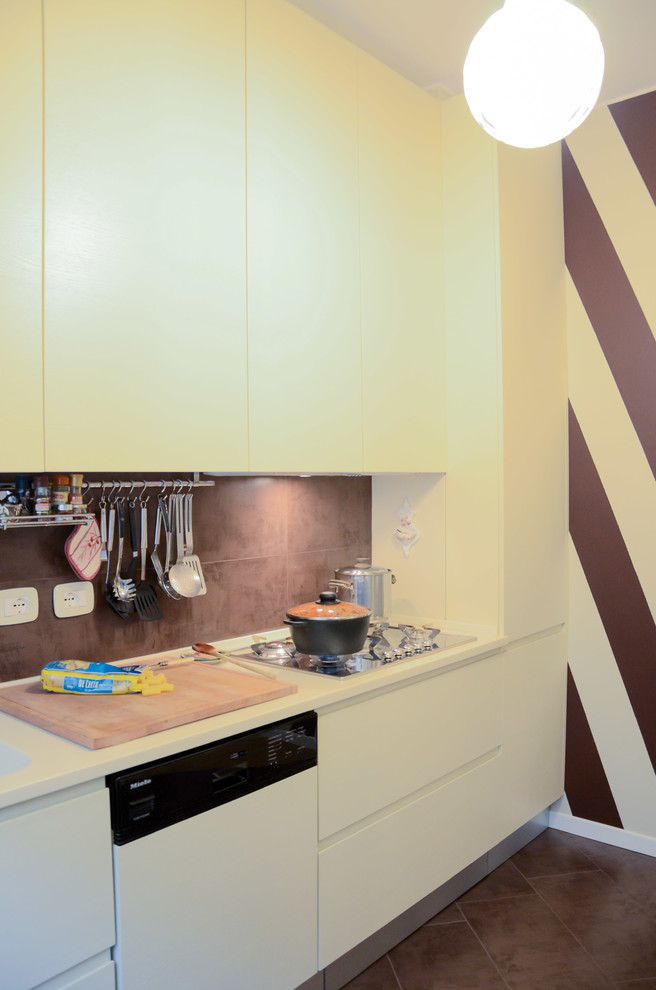 Inspiration for a medium sized contemporary u-shaped enclosed kitchen in Milan with an integrated sink, flat-panel cabinets, beige cabinets, engineered stone countertops, brown splashback, porcelain splashback, integrated appliances, porcelain flooring and a breakfast bar.