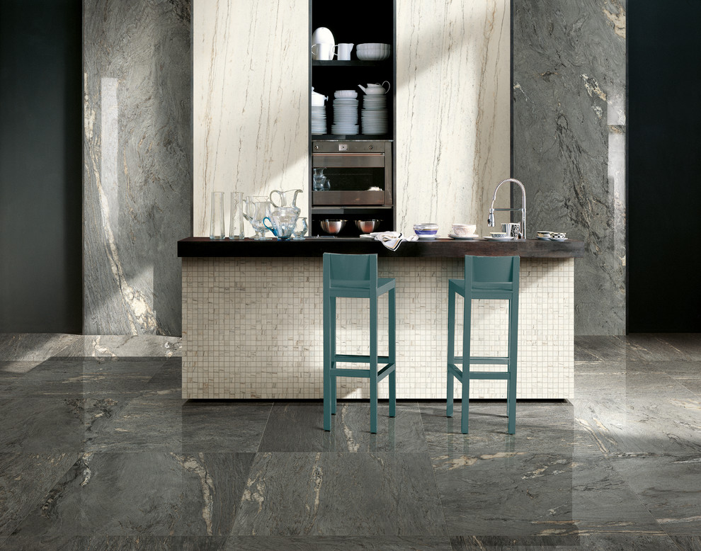 Ispirazione per una cucina minimalista di medie dimensioni con ante bianche, pavimento in gres porcellanato e pavimento grigio