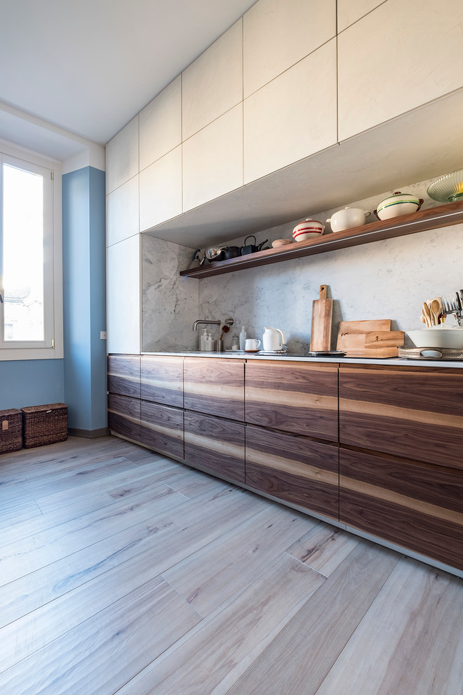Идея дизайна: прямая кухня среднего размера в скандинавском стиле с плоскими фасадами без острова