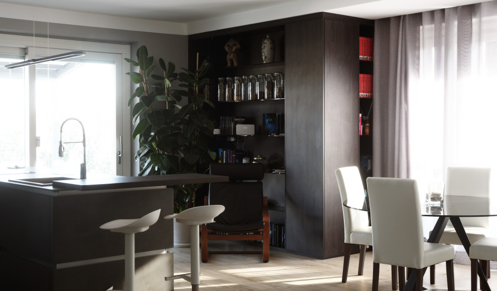Foto di una cucina minimalista di medie dimensioni con lavello da incasso, ante lisce, ante in legno scuro, pavimento beige e top grigio