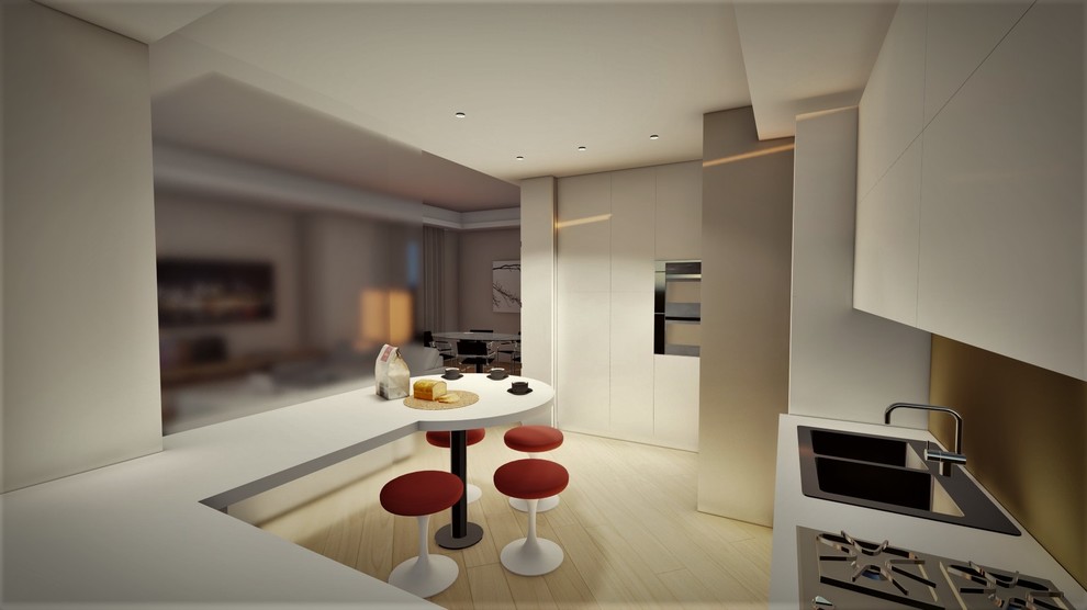Immagine di una cucina design di medie dimensioni con parquet chiaro