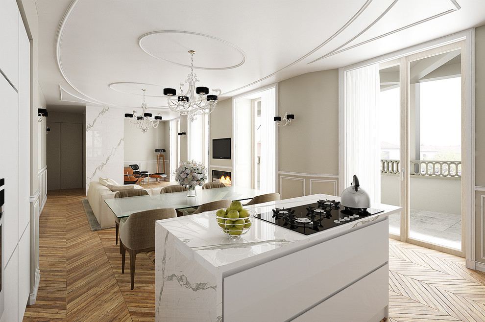 Esempio di una cucina contemporanea con pavimento in legno massello medio