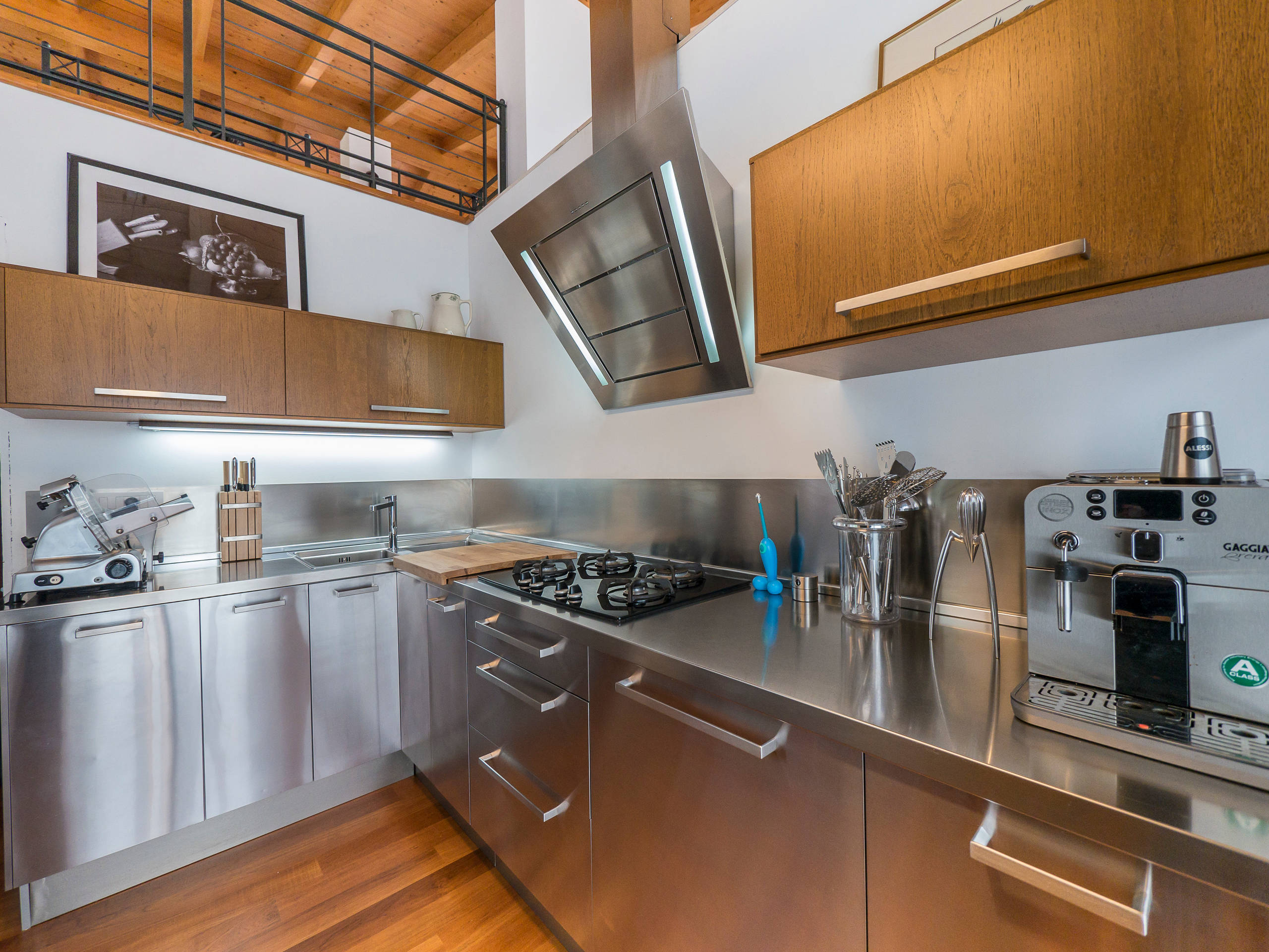 Modern domestic kitchen design with wood cabinet, stainless steel