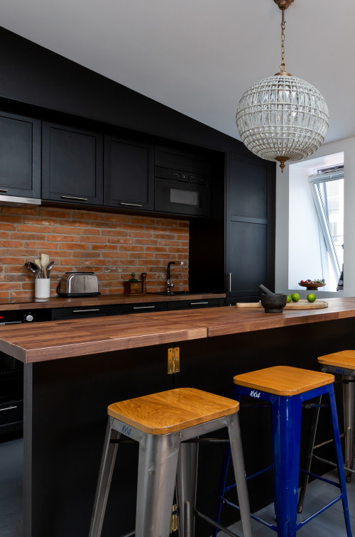 Red Brick Backsplash Inspirations with Wooden Countertop and Black Island