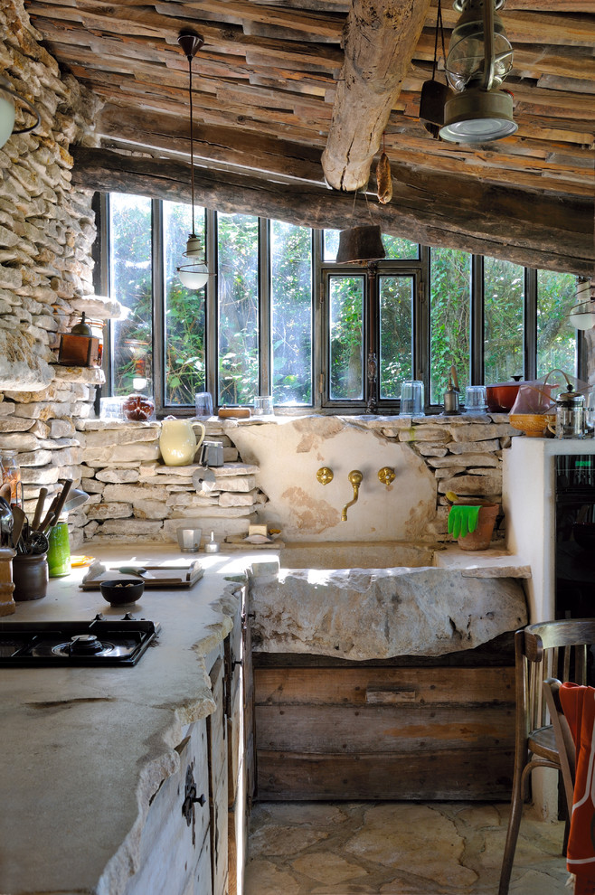 Photo of a small farmhouse l-shaped kitchen/diner in Marseille.