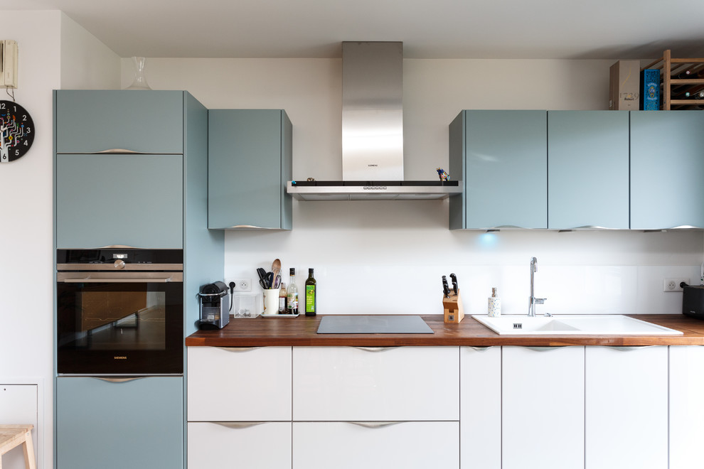 This is an example of a scandi kitchen in Paris.