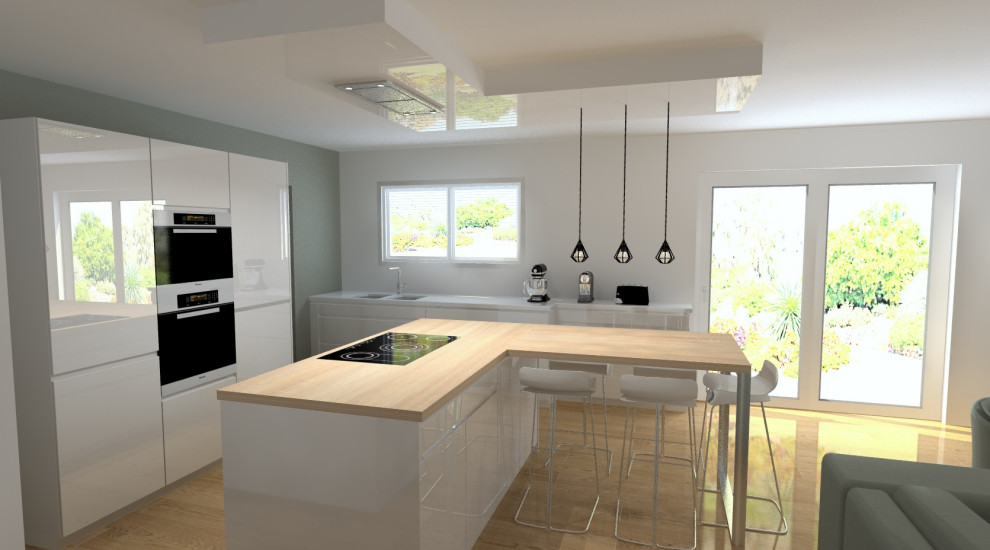 Immagine di una cucina minimal di medie dimensioni con lavello sottopiano, ante a filo, ante bianche, top in quarzite, elettrodomestici in acciaio inossidabile, parquet chiaro e top bianco