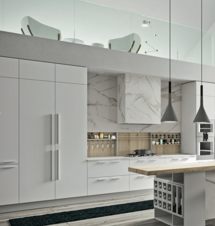 Photo of a large contemporary single-wall open plan kitchen in Lyon with white cabinets, an island, white worktops, a submerged sink, beaded cabinets, marble worktops, wood splashback, stainless steel appliances and light hardwood flooring.