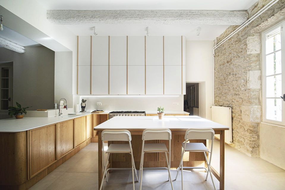 Design ideas for a modern kitchen in Other with white splashback, an island and white worktops.