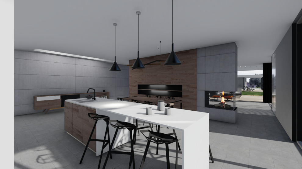 Modelo de cocina lineal contemporánea grande abierta con fregadero bajoencimera, electrodomésticos negros, suelo de cemento, una isla, suelo gris y encimeras blancas
