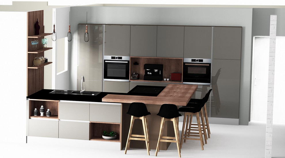 Eat-in kitchen - large contemporary u-shaped eat-in kitchen idea in Lyon with an undermount sink, granite countertops, an island and black countertops