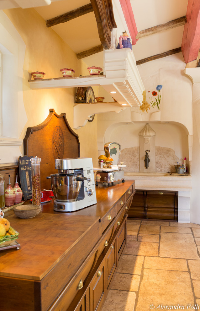 Mediterranean single-wall open plan kitchen in Nice with no island.