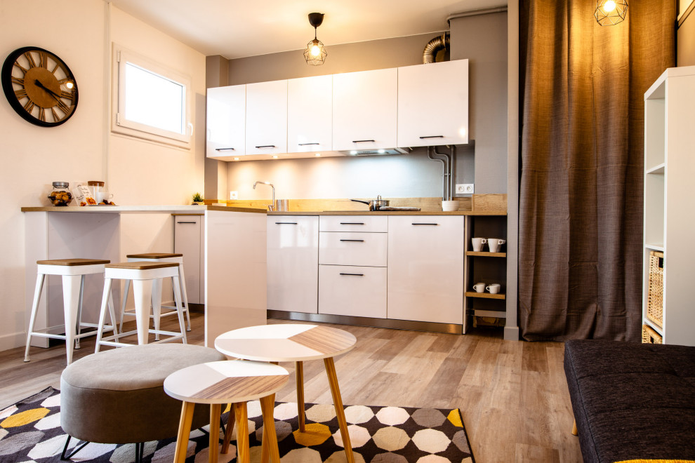 This is an example of a scandi kitchen in Lyon.