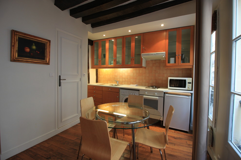 Example of a small trendy single-wall open concept kitchen design in Paris