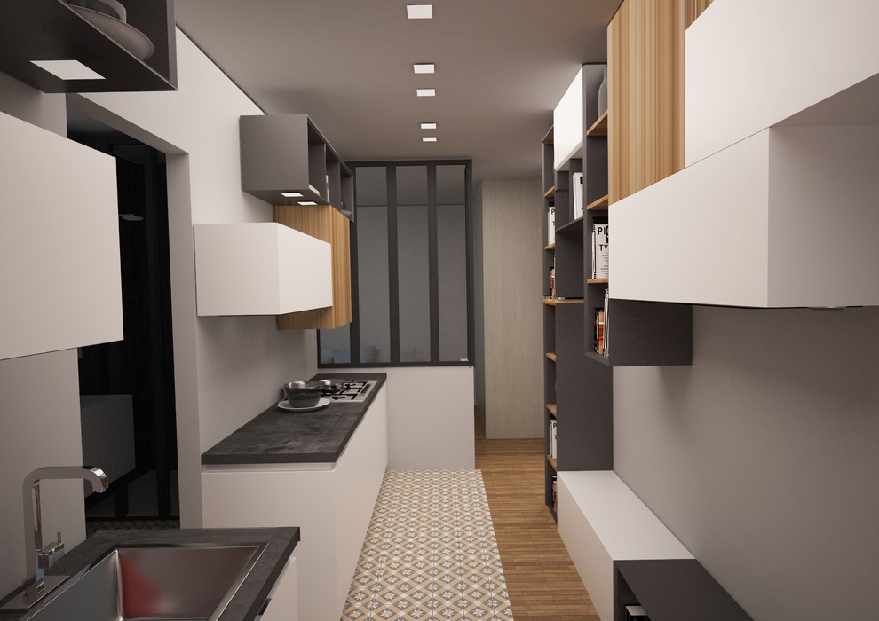 Design ideas for a small urban single-wall open plan kitchen in Paris with a built-in sink, concrete worktops, glass sheet splashback, stainless steel appliances and ceramic flooring.