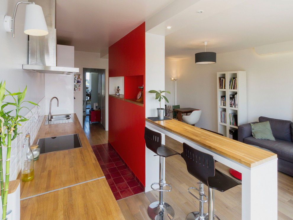Photo of a medium sized contemporary single-wall open plan kitchen in Nantes with an island.