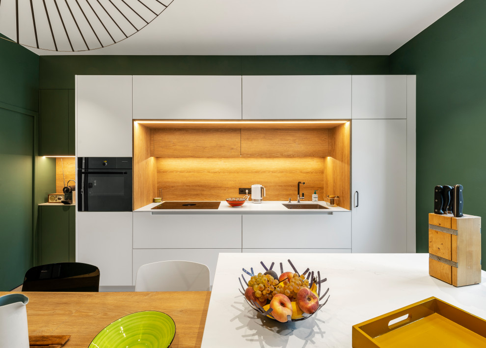 Стильный дизайн: отдельная, прямая кухня в современном стиле с островом - последний тренд
