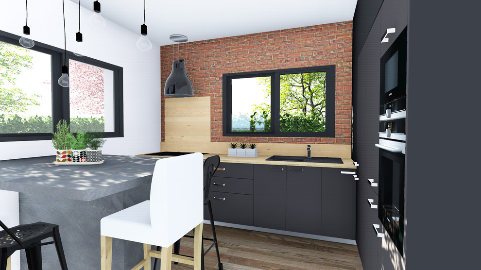 Mittelgroße Industrial Küche mit Betonarbeitsplatte, Küchenrückwand in Grau, Zementfliesen für Boden und Kücheninsel in Toulouse