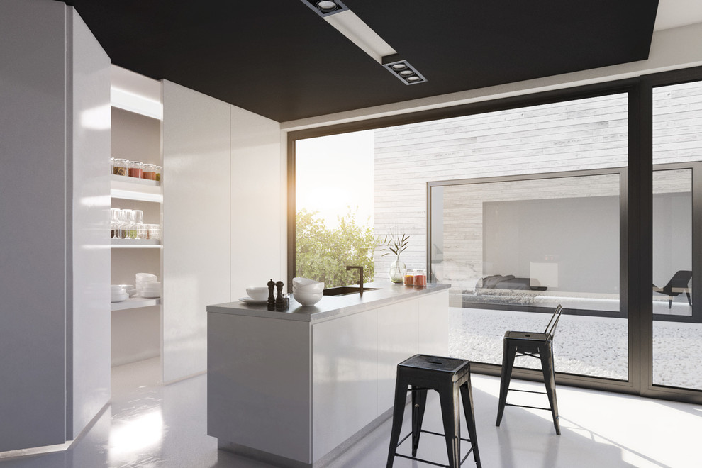 Imagen de cocina comedor lineal contemporánea de tamaño medio con puertas de armario blancas y una isla