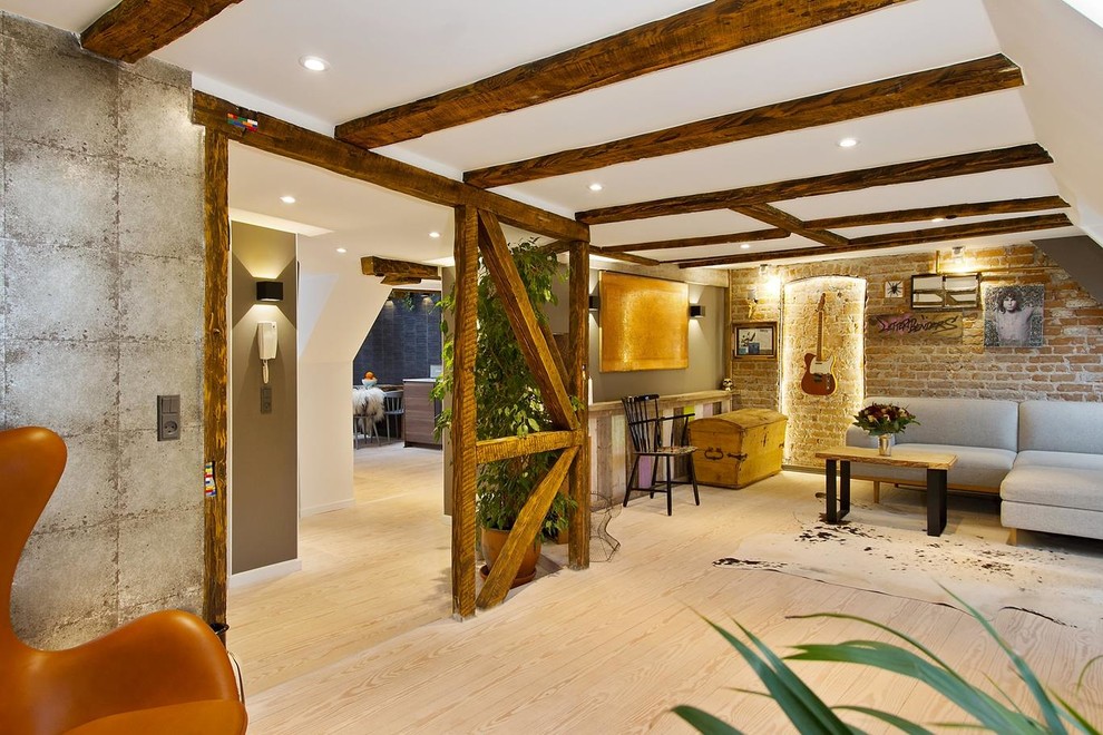 Medium sized scandi living room in Copenhagen with light hardwood flooring.