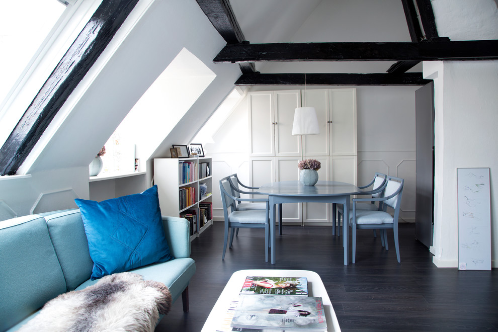 Living room - mid-sized scandinavian formal and open concept dark wood floor living room idea in Copenhagen with white walls, no fireplace and no tv