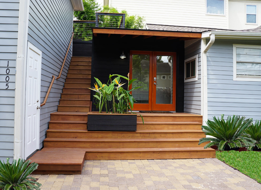 Источник вдохновения для домашнего уюта: терраса среднего размера на заднем дворе в стиле модернизм с навесом