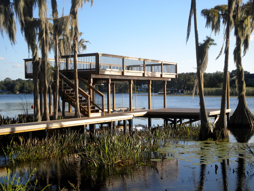 Inspiration for a medium sized world-inspired back terrace in Orlando with a dock and no cover.