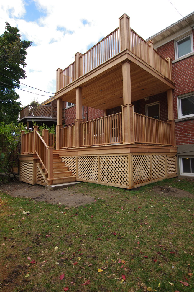 2 story deck Traditional Deck Montreal by Renovation Urbain