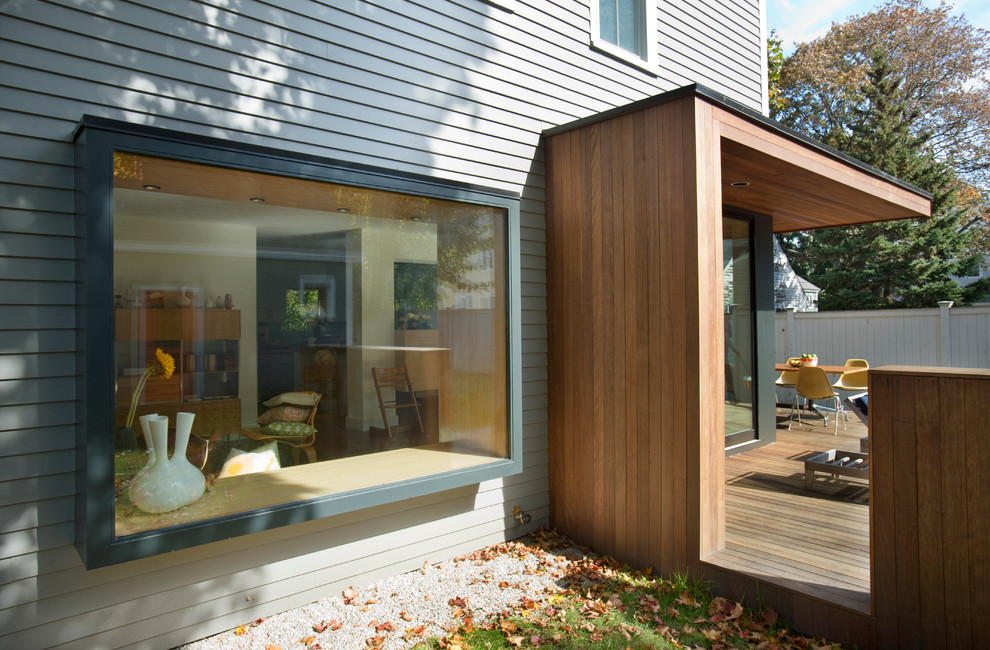 This is an example of a large contemporary back terrace in Boston with no cover.