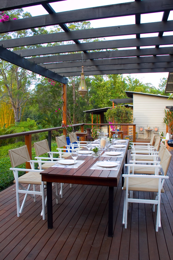 Design ideas for a medium sized classic back terrace in Sunshine Coast with a pergola.