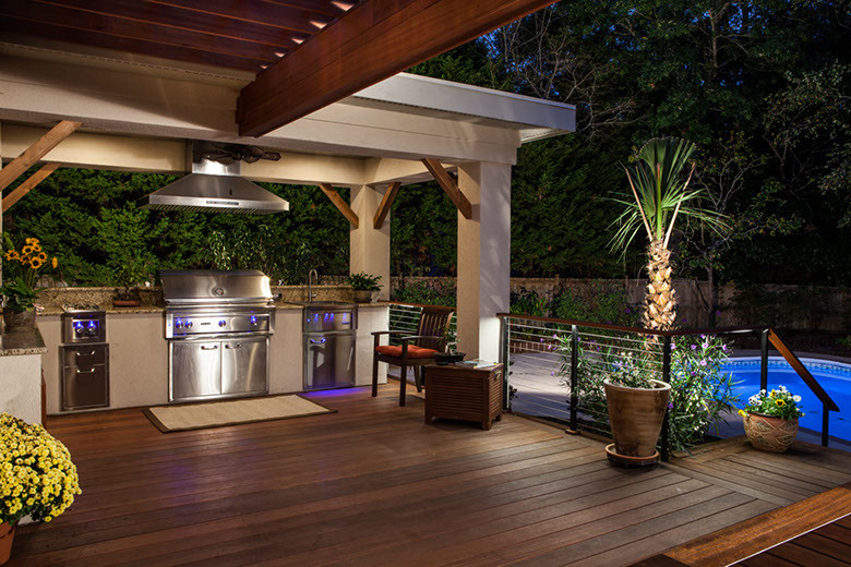 Design ideas for a large traditional back terrace in Wilmington with an outdoor kitchen and a pergola.