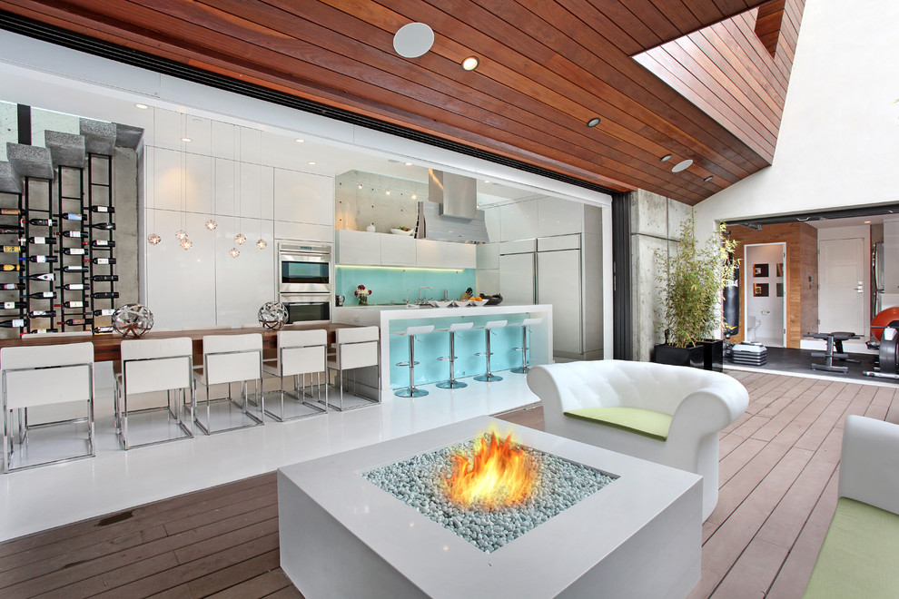 Trendy deck photo in Orange County with a fire pit